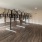 a room with a wood floor and metal bars