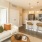 a living room with a couch and a table and a kitchen island in the back
